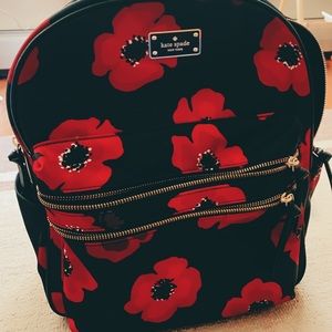 Kate Spade “poppy bookpack” with handle care card